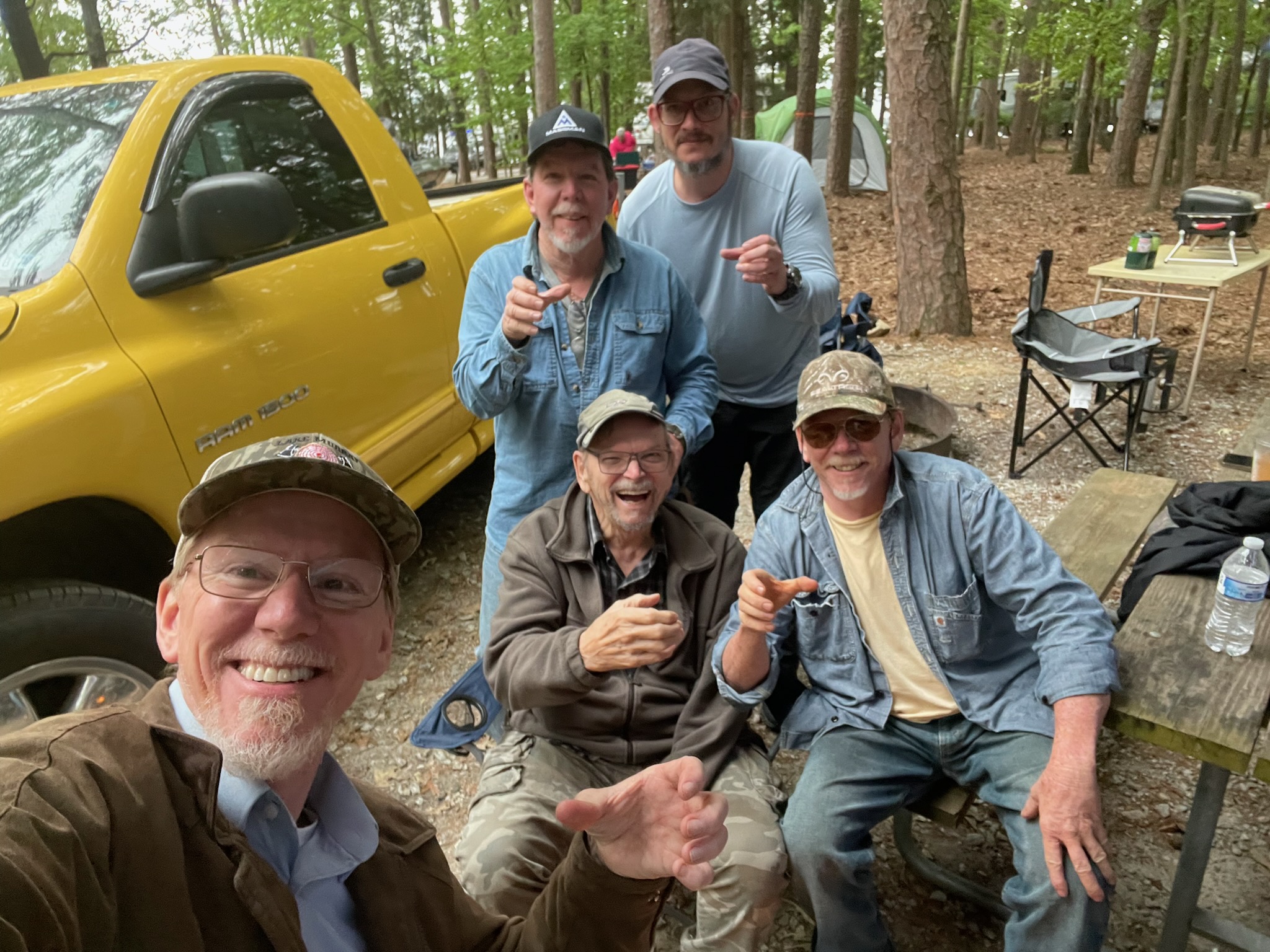 Group of sportsmen at camp